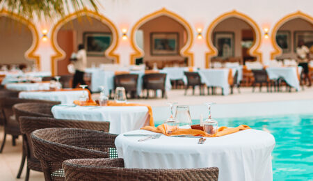 Summer empty open air cafe near sea at exotic island Luxury beachfront hotels in Muscat Oman with sea view and modern architecture